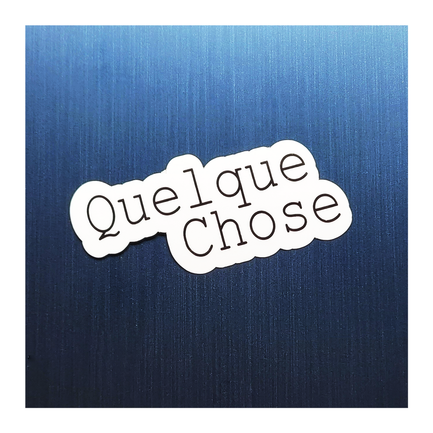 Quelque Chose Sticker